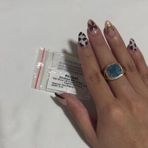 Elegant Blue Crystal Ring with Gold Accents